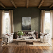 Modern Melina coffee table by Classic Home featuring a sleek wooden surface and sturdy metal legs in a contemporary style.