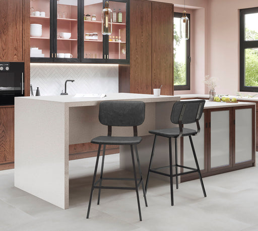 Set of two Lumi Source Foundry contemporary black and gray barstools with zig zag stitching, featuring modern design and padded seats.