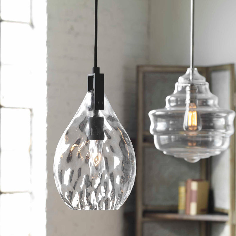 Uttermost Campester 1 Light Watered Glass Mini Pendant in Pearl Silver hanging from ceiling, showcasing pendant lighting design.
