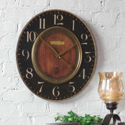Uttermost Alexandre Martinot 23-inch black wall clock with a sleek modern design and minimalist clock hands.