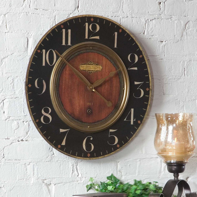 Uttermost Alexandre Martinot 23-inch black wall clock with a sleek modern design and minimalist clock hands.