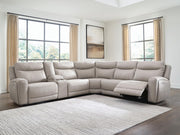 Benchcraft® Gravier reclining sectional sofa with plush cushions and reclining features, shown in a modern living room setting.