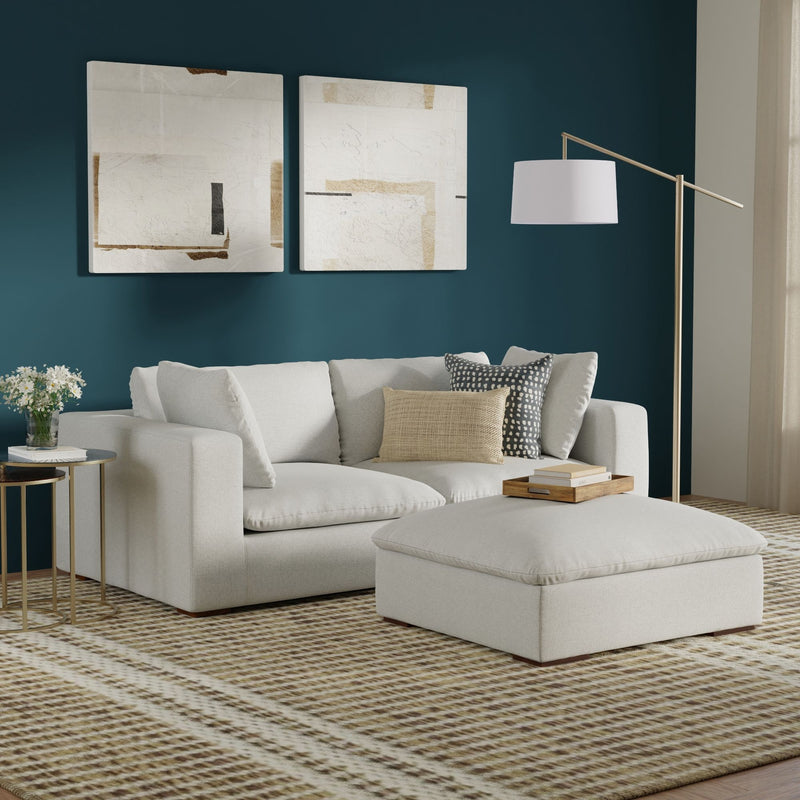 Handcrafted Jasmine sofa and ottoman from Simpli-Home 2-piece living room set, featuring plush fabric and contemporary design.