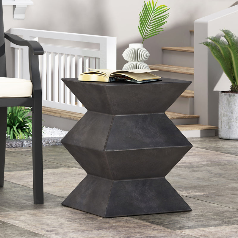 Outdoor lightweight concrete side table by Noble House with copper finish, featuring a round top and sleek modern design.