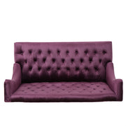 Noble House upholstered loveseat with wing back and diamond tufting, showcasing plush fabric and elegant design.