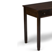 Warm Shaker desk in tobacco brown by Simpli-Home, featuring a classic wooden design with a spacious surface and sturdy legs.