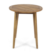 Noble House Stamford modern outdoor bistro table with water-resistant teak finish, ideal for patios and garden dining spaces.