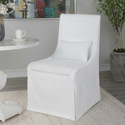 Uttermost Coley armless side chair with upholstered seat and wooden legs, modern design for living or dining spaces.