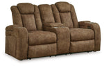 Wolfridge - Power Reclining Loveseat With Console /Adj Hdrst - Brindle - R&R Furniture Gallery (Fountain Valley, CA)