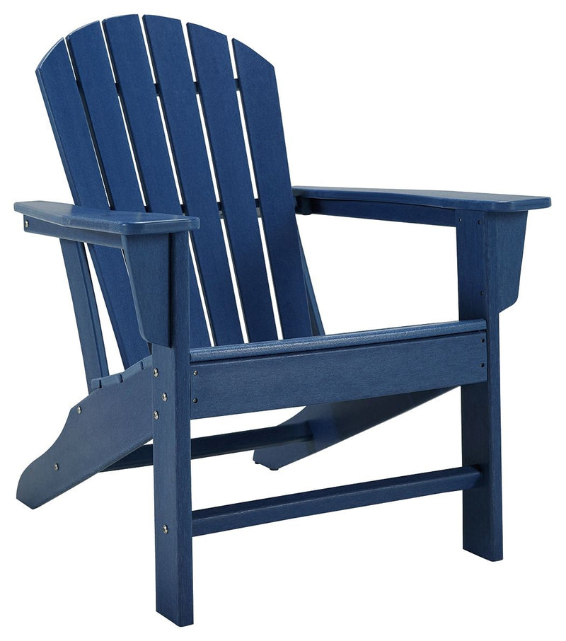 Signature Design by Ashley Sundown Treasure outdoor Adirondack arm chair with wide armrests and rustic finish in a natural setting