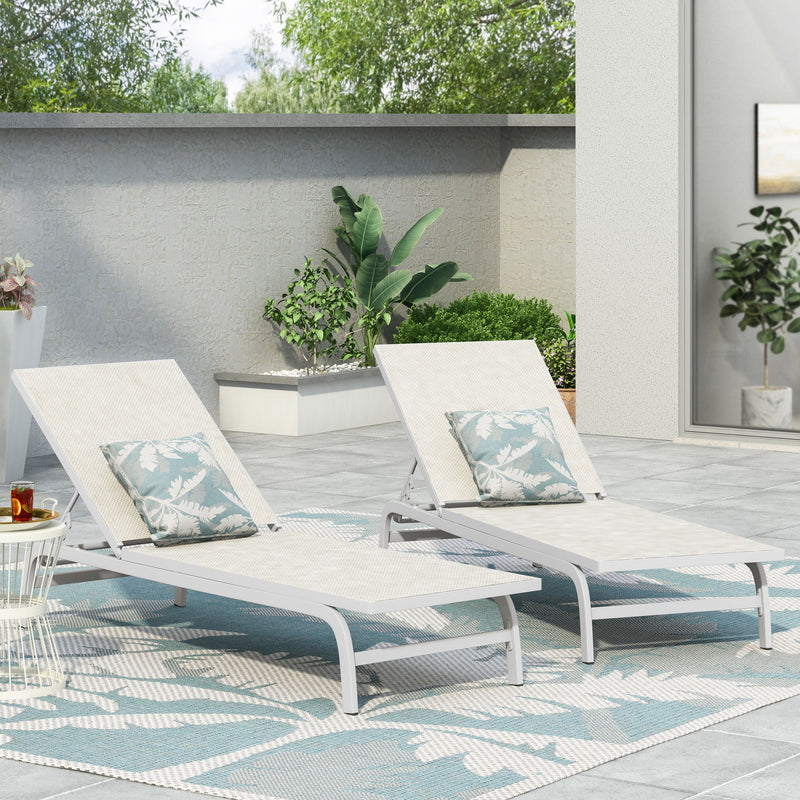 Noble House Finn outdoor chaise lounge with sleek contemporary design, featuring a cushioned seat for relaxing outdoors.