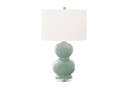 Modern 8th Street contemporary table lamp with sleek design and neutral-colored shade, perfect for living room or bedside lighting.