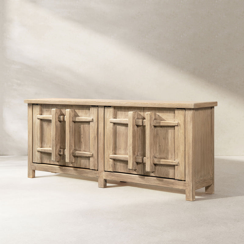 Jennifer Taylor Home Rowan 4-door sideboard cabinet in natural wood finish, showcasing sleek design and storage space.