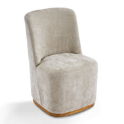 Set of two Noble House indoor upholstered dining chairs with cushioned seats and wooden legs, shown in a stylish dining room setting.