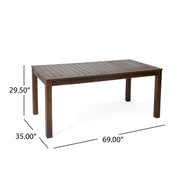 Dark brown Acacia wood outdoor dining table with slatted top by Noble House, showcasing sturdy and stylish outdoor furniture.
