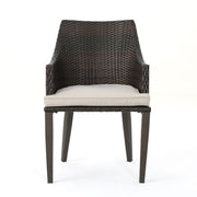 Set of two Noble House Hillhurst outdoor chairs with weather-resistant cushions, perfect for patio relaxation and outdoor dining.