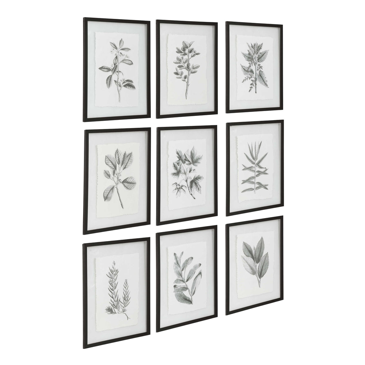 Set of nine farmhouse floral framed prints by Uttermost with black frames, featuring colorful floral artwork on white backgrounds.