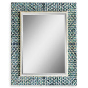 Uttermost Makaria Coastal Mirror in blue wall mirror with a stylish, round frame reflecting coastal decor.