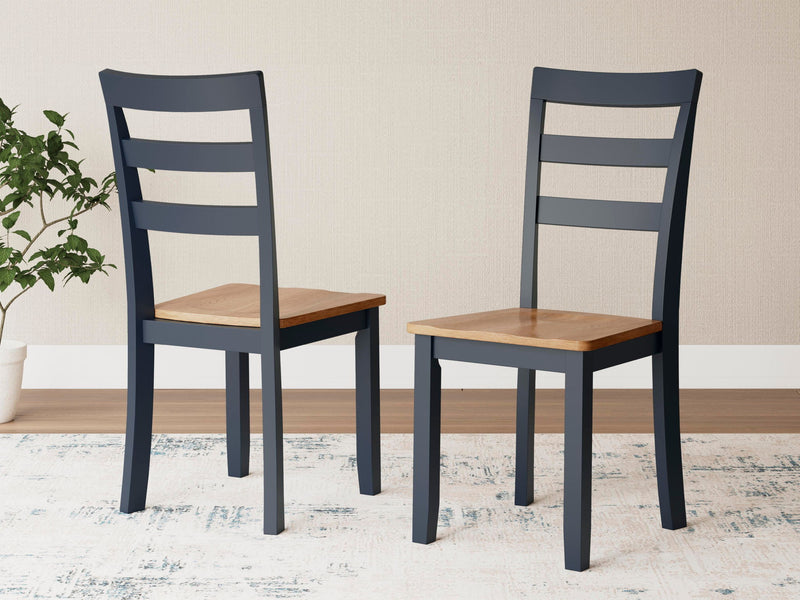 Pair of Signature Design by Ashley Gesthaven dining room side chairs with upholstered seats and wooden legs, set of two.