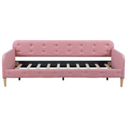 Dreamland upholstered daybed with modern design, featuring plush fabric, clean lines, and a sturdy wooden frame.