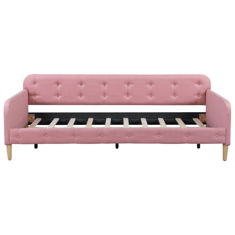 Dreamland upholstered daybed with modern design, featuring plush fabric, clean lines, and a sturdy wooden frame.