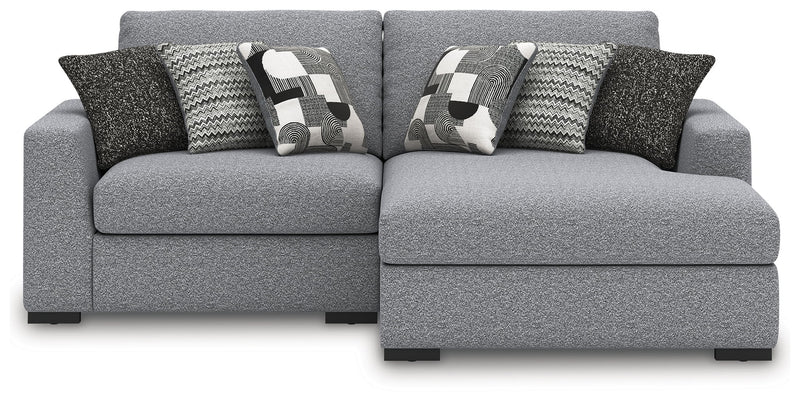 Benchcraft Bealton stationary sectional sofa with beige fabric upholstery and plush cushions in a modern living room setting.