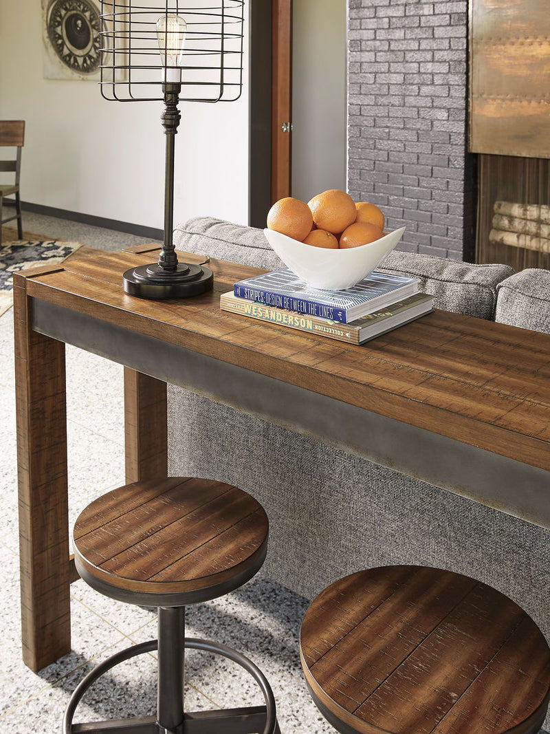 Torjin - 3 Pc. - Long Counter Table, 2 Stools - Dark Brown - R&R Furniture Gallery (Fountain Valley, CA)