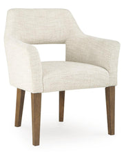 Set of two Benchcraft® Marxmore dining upholstered arm chairs in beige and brown with padded seats and armrests.
