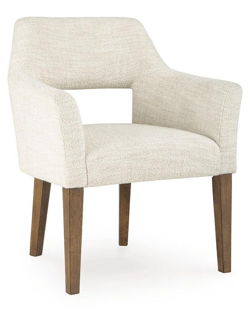 Set of two Benchcraft® Marxmore dining upholstered arm chairs in beige and brown with padded seats and armrests.