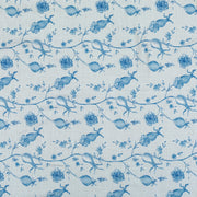 Dolce TOV Furniture placemat set featuring elegant, patterned tablecloths arranged on a dining table.