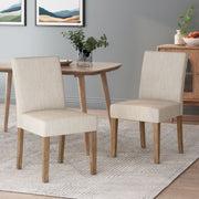 Contemporary Noble House dining chair set with upholstered seats and tapered wooden legs, modern and stylish for dining rooms.
