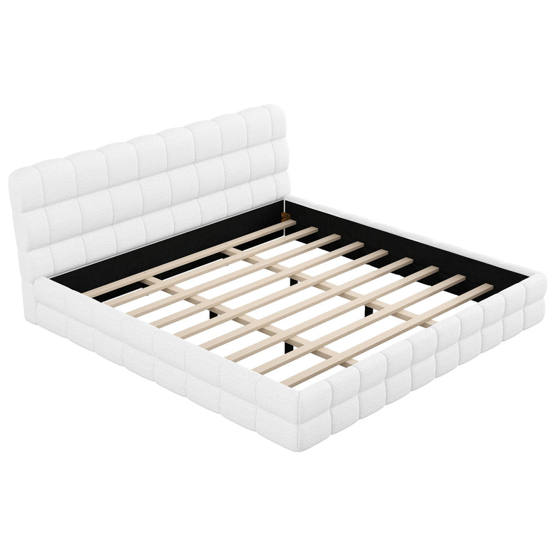 Dreamland upholstered platform bed with padded headboard, featuring a modern design and soft fabric upholstery for a cozy bedroom look.