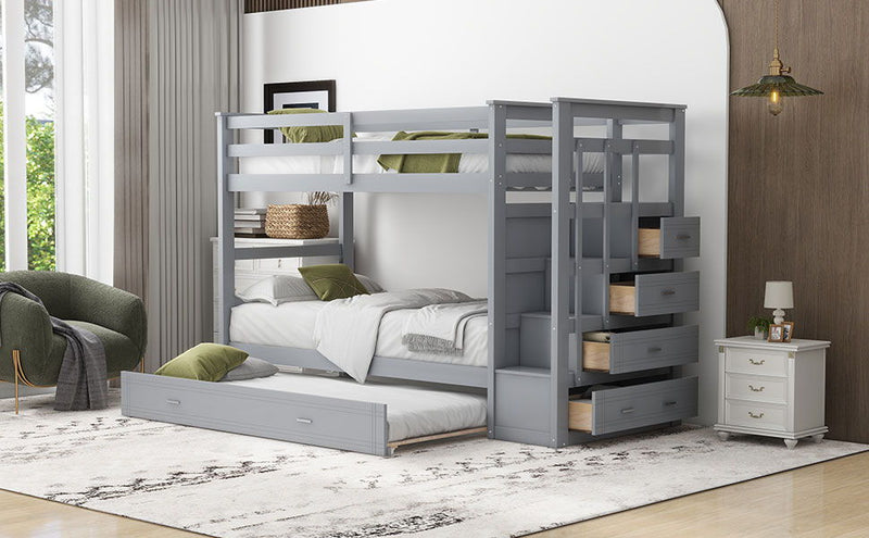 DreamHaus bunk bed with trundle and staircase, featuring sturdy wood construction and space-saving design in a modern bedroom setting.