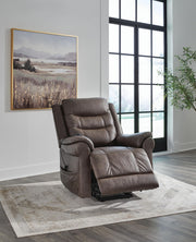 Signature Design by Ashley Oatman Power Lift Recliner in neutral fabric, showing cushioned seat, backrest, and armrests.