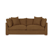 Classic Home Audrey stationary sofa with plush fabric upholstery and elegant design, shown in a cozy living room setting.