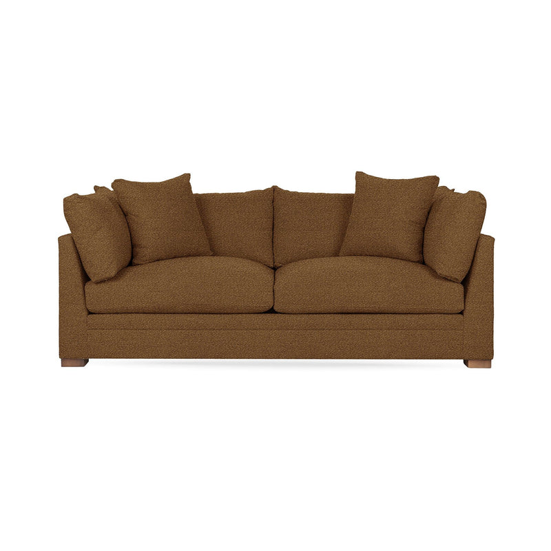 Classic Home Audrey stationary sofa with plush fabric upholstery and elegant design, shown in a cozy living room setting.