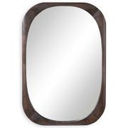 Dark brown Sheldon mid-century wall mirror by Uttermost with a sleek, modern frame hanging on a wall.