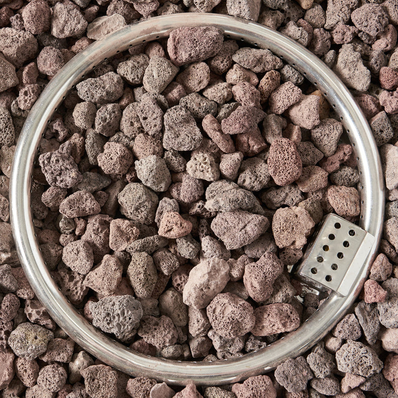 Round Noble House iron fire pit with 40,000 Btu burner, featuring a sturdy metal design and a spacious top for outdoor fires.