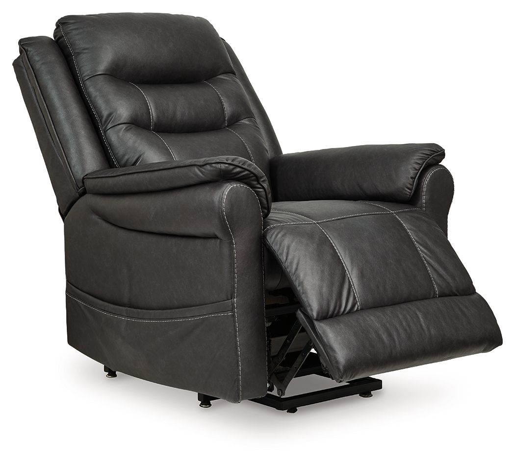 Signature Design by Ashley Oatman Power Lift Recliner in plush fabric with padded armrests and a reclining mechanism.