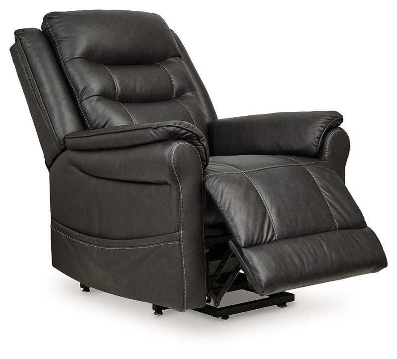 Signature Design by Ashley Oatman Power Lift Recliner in plush fabric with padded armrests and a reclining mechanism.