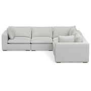 Simpli-Home Jasmine handcrafted stationary sectional sofa with plush beige upholstery and sleek modern design.