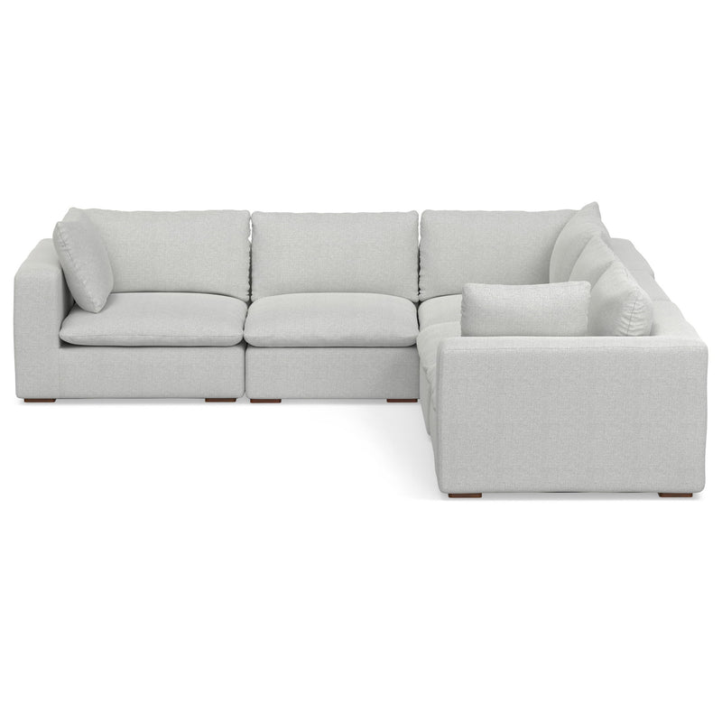 Simpli-Home Jasmine handcrafted stationary sectional sofa with plush beige upholstery and sleek modern design.