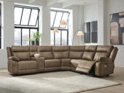 Signature Design by Ashley Max-Momentum reclining sectional with plush cushions and wide chaise lounge in a modern fabric.