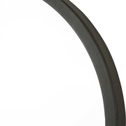 Uttermost Taft wall mirror with a sleek, modern frame, reflecting a stylish interior design.