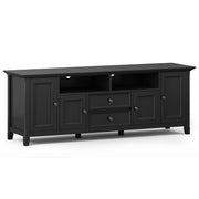 Simpli-Home Amherst wide TV media stand with open shelves and storage compartments for entertainment devices and accessories.
