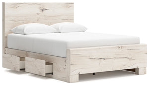 Signature Design by Ashley Lawroy storage panel bed with built-in drawers and modern wood finish, shown in a cozy bedroom setting.