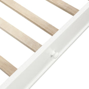 White DreamHaus twin size daybed with a matching twin size trundle, showcasing a sleek, modern design with clean lines.