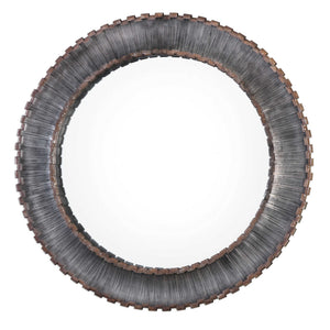 Uttermost Tanaina round wall mirror with silver frame, reflecting a modern, stylish decor element for wall decoration.