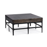 Adela coffee table in Rust Noir finish with sleek modern design, featuring a smooth tabletop and sturdy base from Classic Home.