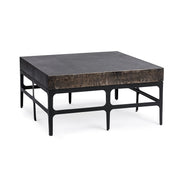Adela coffee table in Rust Noir finish with sleek modern design, featuring a smooth tabletop and sturdy base from Classic Home.